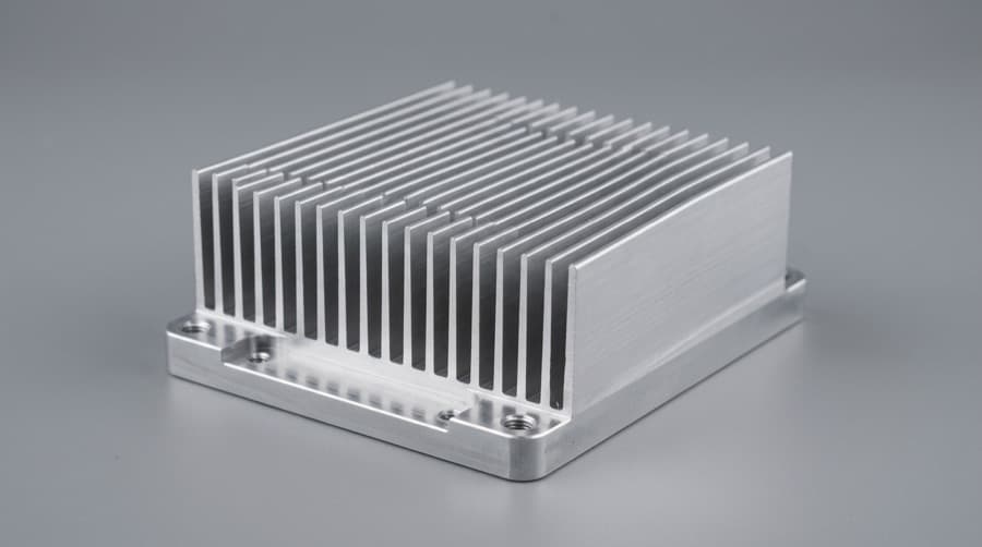 Aluminum heat sink for electronics cooling — 6061 or 6063, standard choice for air-cooled fin heat sinks